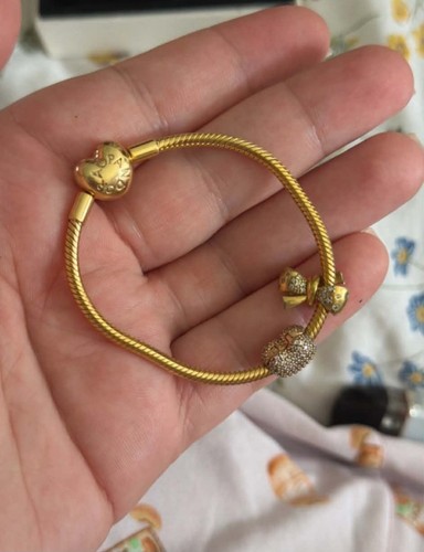 Pandora gold bracelet with - pandora,